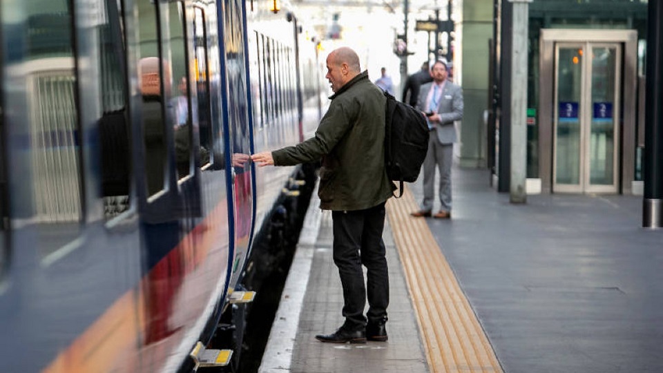 Passenger boarding Paragon bi-mode train of Hull Trains