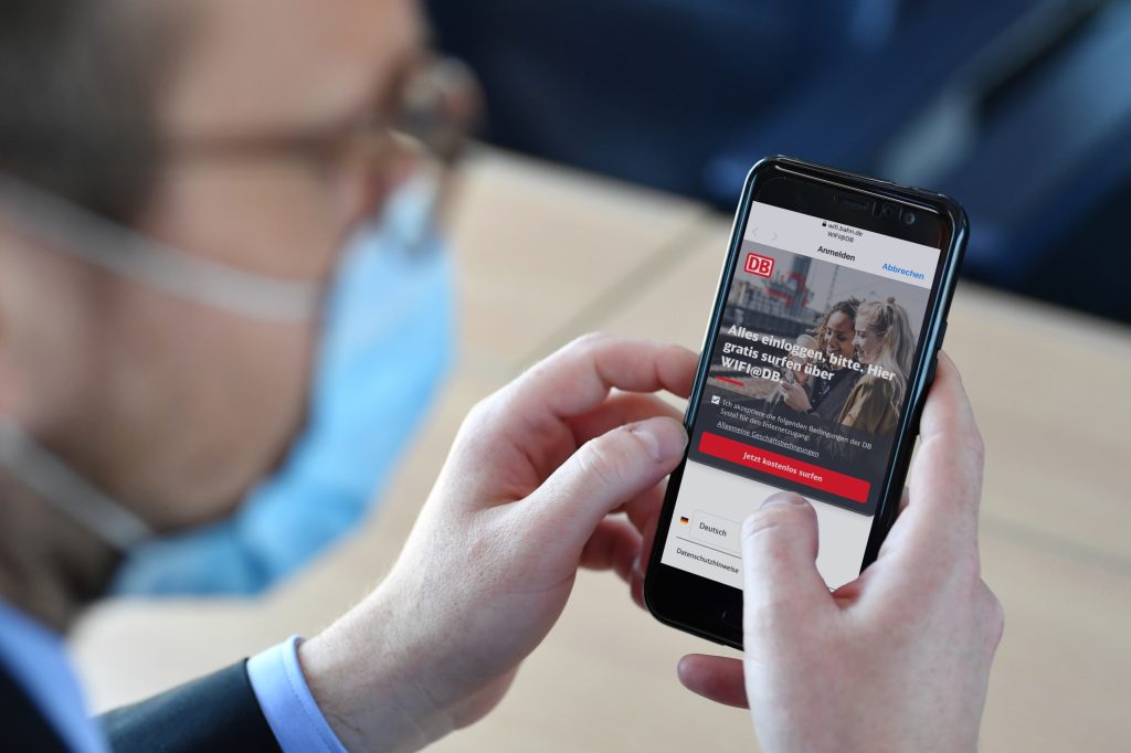 Businessman operating a smartphone