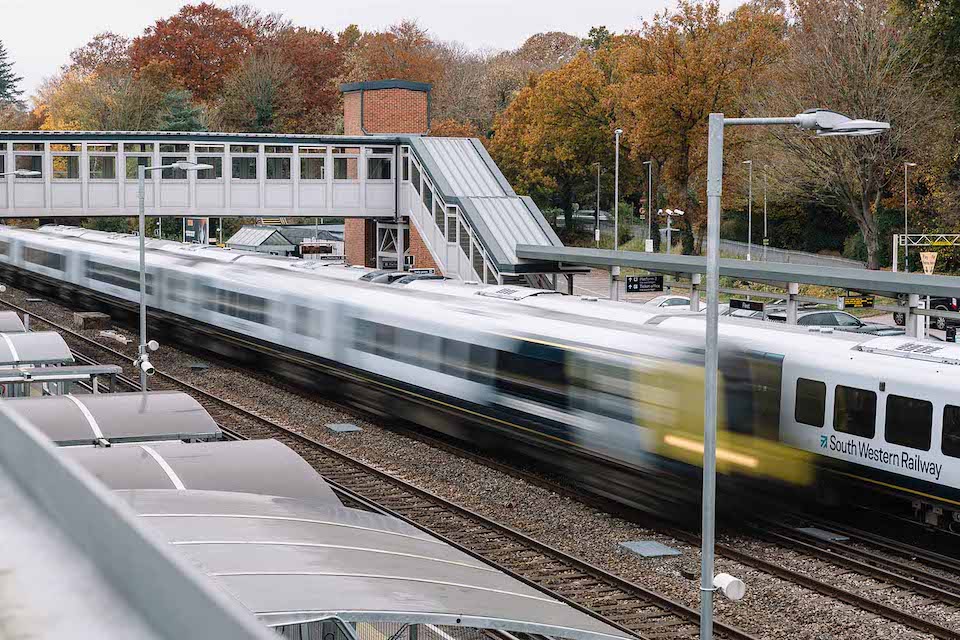 Blurred shot of South Western Railways trains passing at speed